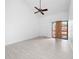 Bedroom featuring vaulted ceiling, sliding glass doors, and light wood-look flooring at 1092 E Michigan St # 1, Orlando, FL 32806