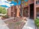 Condominium exterior featuring a well-maintained landscape and private balconies at 1092 E Michigan St # 1, Orlando, FL 32806
