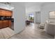 Open-concept space connecting the living area, dining room, and kitchen at 1092 E Michigan St # 1, Orlando, FL 32806