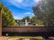 A view of the pond featuring a fountain and lush landscaping, seen from the yard and steps at 1092 E Michigan St # 1, Orlando, FL 32806