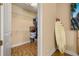 Walk-in closet featuring wire shelving and a surfboard at 115 Ellington Pl, Oviedo, FL 32765