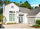 The home features a stylish exterior, beautiful door, and well-manicured landscaping at 1188 Brampton Pl, Lake Mary, FL 32746