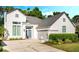 The home features a stylish exterior, beautiful door, and well-manicured landscaping at 1188 Brampton Pl, Lake Mary, FL 32746