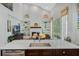 Modern kitchen with island, stainless steel appliances, open to living area, and lots of natural light at 1188 Brampton Pl, Lake Mary, FL 32746