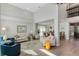 Bright living space with high ceilings, neutral tones, hardwood floors, and adjacent dining area at 1188 Brampton Pl, Lake Mary, FL 32746