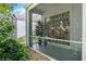 Screened-in patio with greenery outside at 1188 Brampton Pl, Lake Mary, FL 32746
