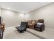 Finished basement with varied seating options and carpeted flooring at 12002 Angle Pond Ave, Windermere, FL 34786