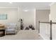 Loft area with exercise equipment and room for activities at 12002 Angle Pond Ave, Windermere, FL 34786