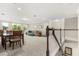 Open concept living area featuring a dining area and casual seating at 12002 Angle Pond Ave, Windermere, FL 34786