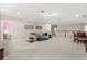 Cozy loft area featuring comfortable seating, neutral decor, and ample space for relaxation at 12002 Angle Pond Ave, Windermere, FL 34786