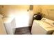 The laundry room has a washer, dryer, and a water heater at 1400 Lake Shadow Cir # 10105, Maitland, FL 32751