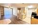 Open floor plan of living room, kitchen, and dining area with modern finishes and natural light at 1400 Lake Shadow Cir # 10105, Maitland, FL 32751