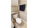A bathroom features a toilet, a granite shelf, and towel rack at 1400 Lake Shadow Cir # 10105, Maitland, FL 32751