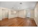 Inviting living room showcasing hardwood floors and neutral wall color at 14645 Tullamore Loop, Winter Garden, FL 34787