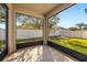 Relaxing screened-in patio with an outdoor view of the backyard at 14645 Tullamore Loop, Winter Garden, FL 34787