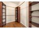 Walk-in closet features custom shelving and ample storage space at 14645 Tullamore Loop, Winter Garden, FL 34787