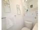 Cozy bathroom featuring white mosaic tiles, sleek fixtures, and modern decor at 1600 W Lake Parker Dr # D5, Lakeland, FL 33805