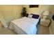 Cozy bedroom featuring a comfortable bed, and nightstand at 1600 W Lake Parker Dr # D5, Lakeland, FL 33805