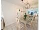 Bright dining room with a glass table, chairs and views to living room at 1600 W Lake Parker Dr # D5, Lakeland, FL 33805