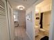 Hallway leading to the bathroom, bedrooms, and other living spaces at 1600 W Lake Parker Dr # D5, Lakeland, FL 33805