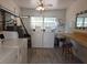 Bright community laundry room with multiple washers, dryers, and ample counter space, offering convenience for residents at 1600 W Lake Parker Dr # D5, Lakeland, FL 33805