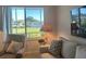 Comfortable seating area with bright windows, green views, and neutral colors at 1600 W Lake Parker Dr # D5, Lakeland, FL 33805