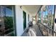 Enclosed porch area with chairs and plants, offering a peaceful outdoor space at 1600 W Lake Parker Dr # D5, Lakeland, FL 33805