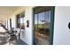 A view from the outside porch, reflected in the glass front door at 1600 W Lake Parker Dr # D5, Lakeland, FL 33805