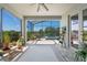 Inviting patio with scenic views, stylish outdoor furniture, and a serene ambiance for relaxing and enjoying the outdoors at 16781 Meadows St, Clermont, FL 34714