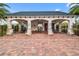 Community pool cabana with outdoor seating and a view of the pool at 16781 Meadows St, Clermont, FL 34714