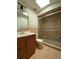 Bathroom featuring a vanity with a sink, a toilet, and a glass door shower at 170 Lady Susan Ct, Casselberry, FL 32707