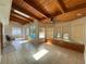 Bright Florida room with tile flooring, skylights, wooden beam ceilings, and pool views at 170 Lady Susan Ct, Casselberry, FL 32707