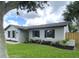 Charming home with lush green lawn, fresh landscaping, and freshly painted exterior, featuring updated fixtures at 170 Lady Susan Ct, Casselberry, FL 32707