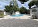 Backyard showcasing a beautiful pool surrounded by a large brick patio at 170 Lady Susan Ct, Casselberry, FL 32707