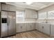 Modern kitchen featuring stainless steel appliances and white countertops at 1704 15Th St, Orange City, FL 32763