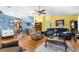 Spacious open-concept living area featuring hardwood floors and great flow between living, dining and kitchen areas at 1969 La Rue Ave, Deltona, FL 32725