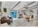 Bright and airy living room with sliding glass doors and views of the outdoor area at 245 Country Circle E Dr, Port Orange, FL 32128