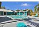 Inviting backyard pool offers relaxation with lounge chairs, providing a perfect retreat in the comfort of home at 245 Country Circle E Dr, Port Orange, FL 32128
