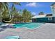 Enjoy this backyard pool with a covered lounge area, perfect for relaxing and entertaining at 245 Country Circle E Dr, Port Orange, FL 32128