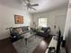 Bright living room with comfortable seating, decorative rug, and modern furnishings at 2964 Lucayan Harbour Circ # 106, Kissimmee, FL 34746