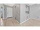 Welcoming entryway featuring neutral walls, tile flooring, and a convenient pass-through to the kitchen at 3012 S Semoran Blvd # 3, Orlando, FL 32822