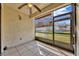 Outdoor patio, featuring a ceiling fan and view of neighboring property at 3012 S Semoran Blvd # 3, Orlando, FL 32822