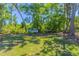 Exterior view of the Wilderness community sign in a wooded area at 3394 Hawkin Dr, Kissimmee, FL 34746