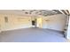 Spacious garage with shelving and room for storage at 3504 Portersfield Rd, Orlando, FL 32808