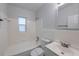 This bathroom includes a shower and tub combination and vanity with sink at 4121 Caywood Cir, Orlando, FL 32810