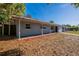 Single-story home with front porch and nice windows, landscaping ready for customization at 4121 Caywood Cir, Orlando, FL 32810
