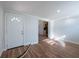Bright room featuring wood-look flooring and freshly painted walls at 4121 Caywood Cir, Orlando, FL 32810