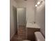 Modern half bathroom featuring a sleek vanity and contemporary fixtures at 444 Sunnyview Cir, Orlando, FL 32810
