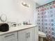 Bathroom with a white vanity and a shower at 444 Sunnyview Cir, Orlando, FL 32810