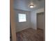 Bright bedroom offering new floors and a closet at 444 Sunnyview Cir, Orlando, FL 32810